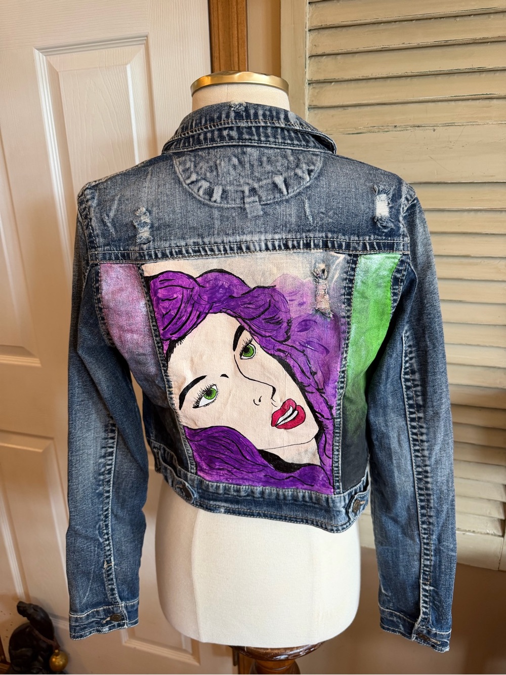 Beautiful painted Wallflower Distressed Light-Mid Blue Cropped Denim Jacket